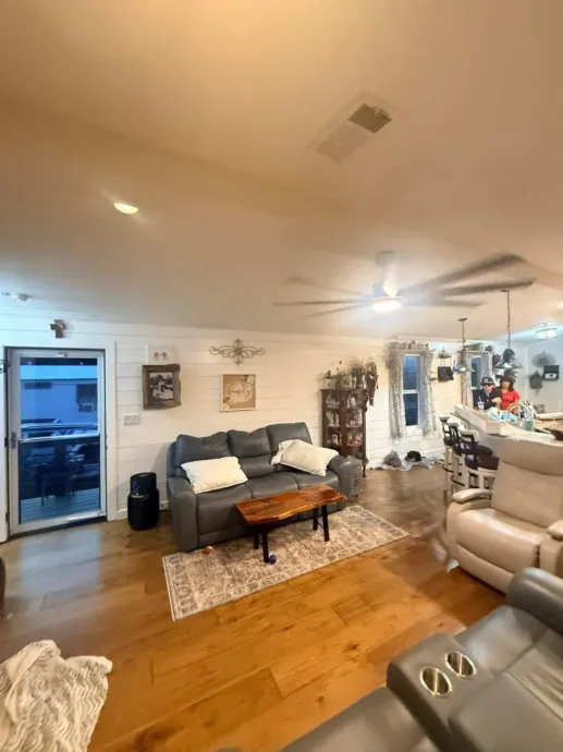 Bright living room with window film that cuts glare while keeping natural light in Houma