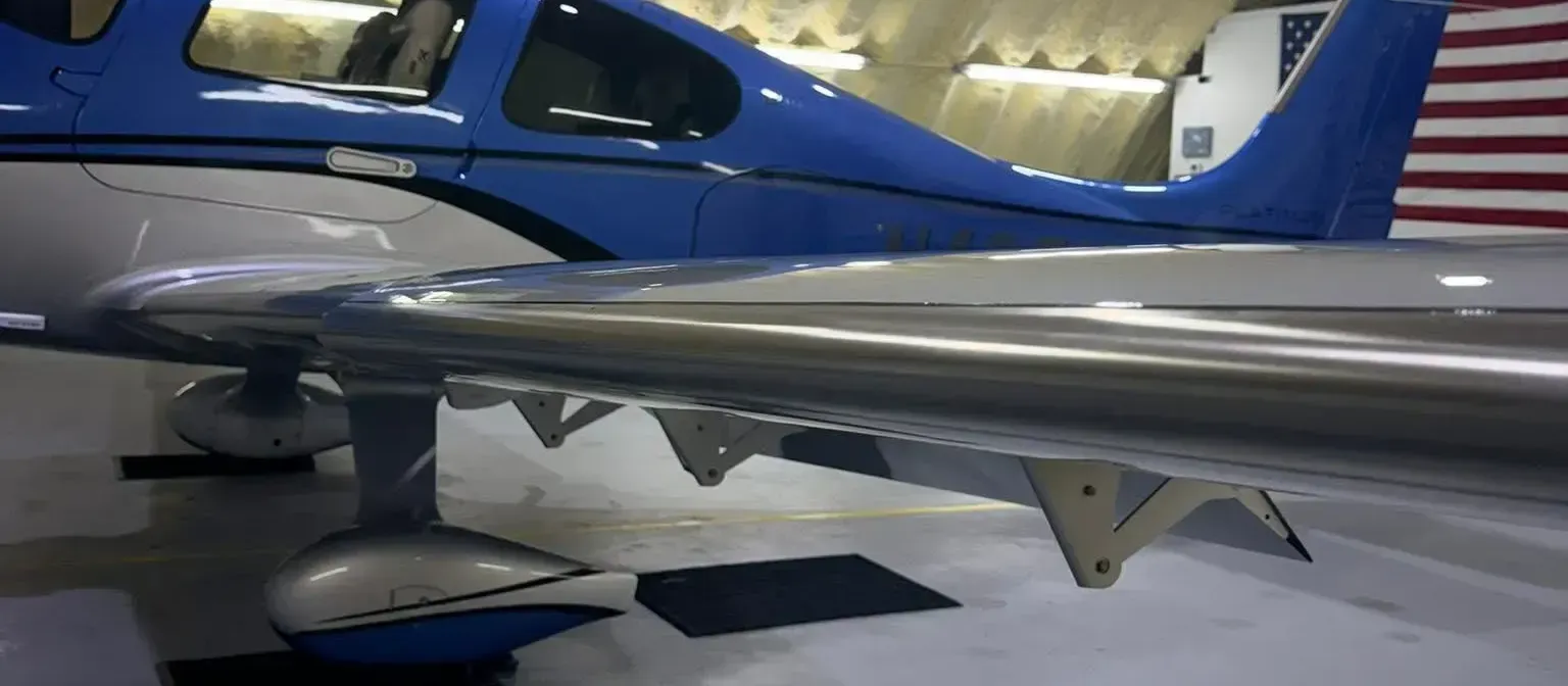 Single engine aircraft in a hangar ready for scheduled aircraft detailing in Houma, LA
