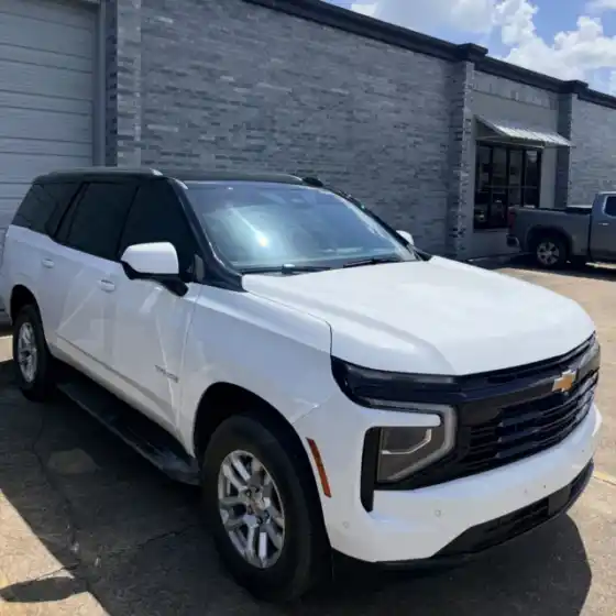 White Chevrolet Tahoe with window tint at South Side Detail And Tint for a Bayou Cane customer