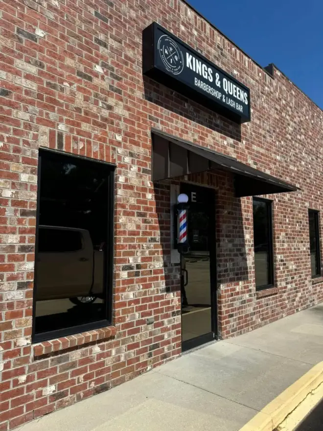 Brick storefront with commercial window tinting in the Houma area